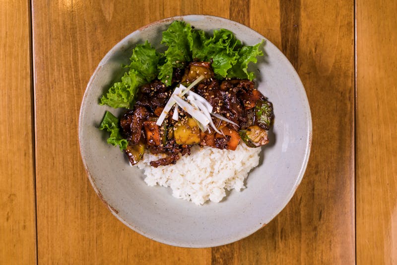 Sweet Pork Bowl with slow-cooked pork and toppings